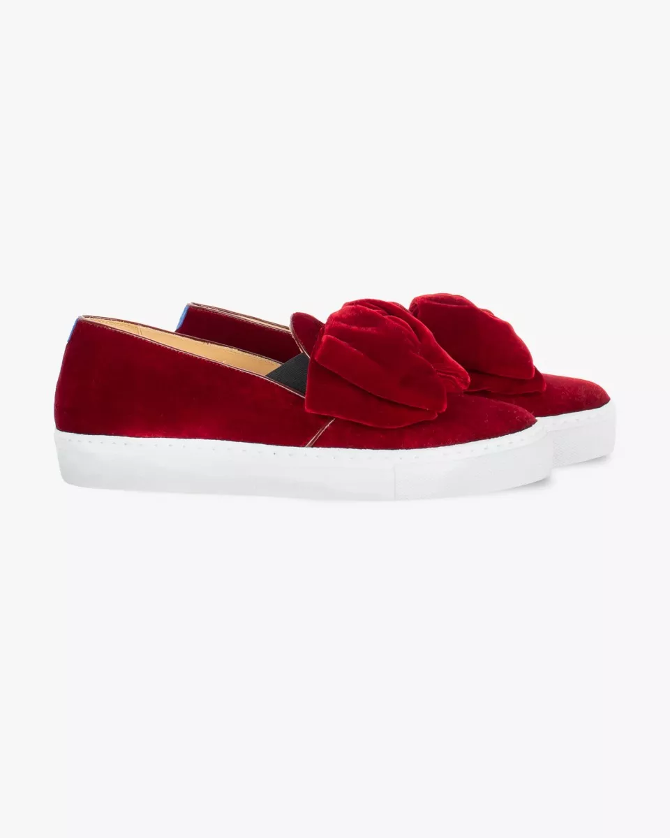Red velvet slip-ons with oversized bow
