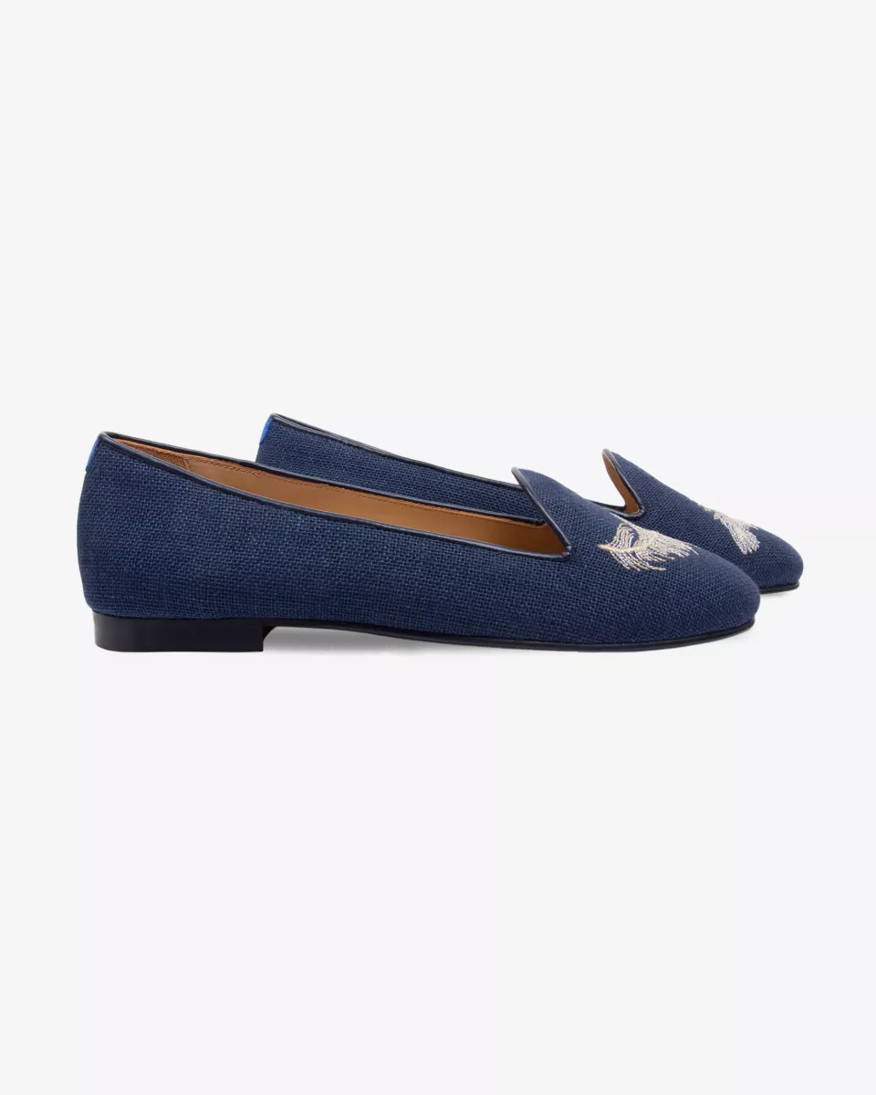 Navy suede slippers embroidered with a white & light gold feather