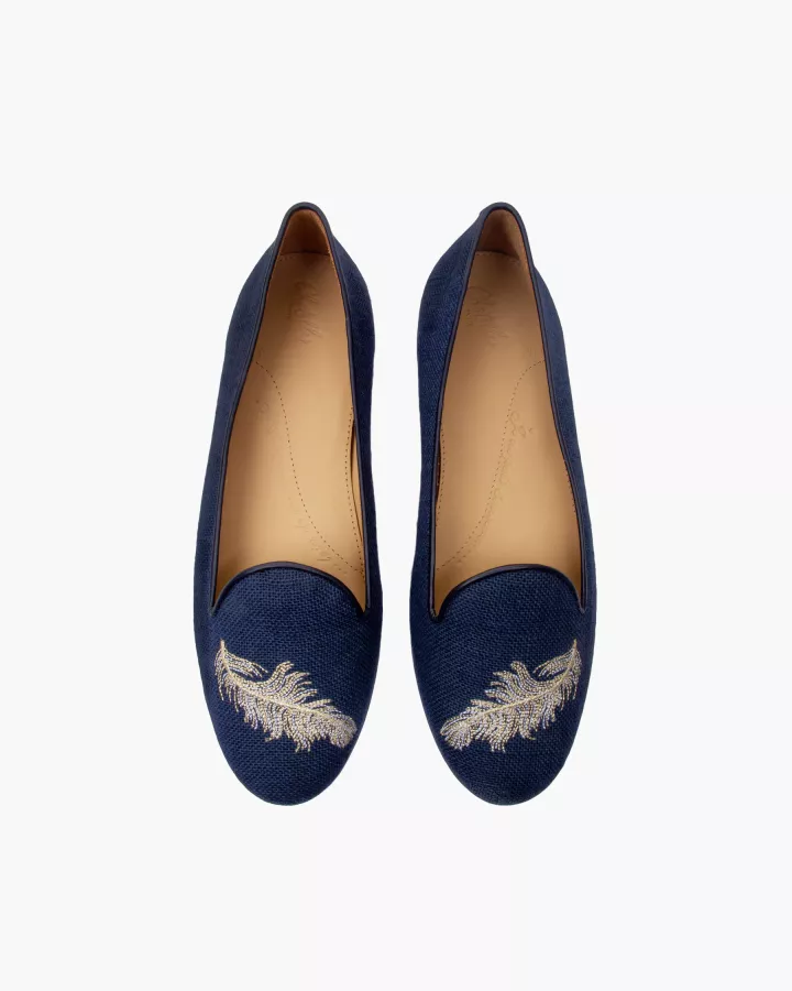 Navy suede slippers embroidered with a white & light gold feather